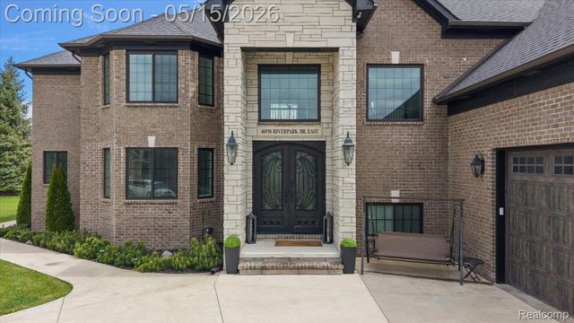 46930 Riverpark E, Macomb Township, MI 48044