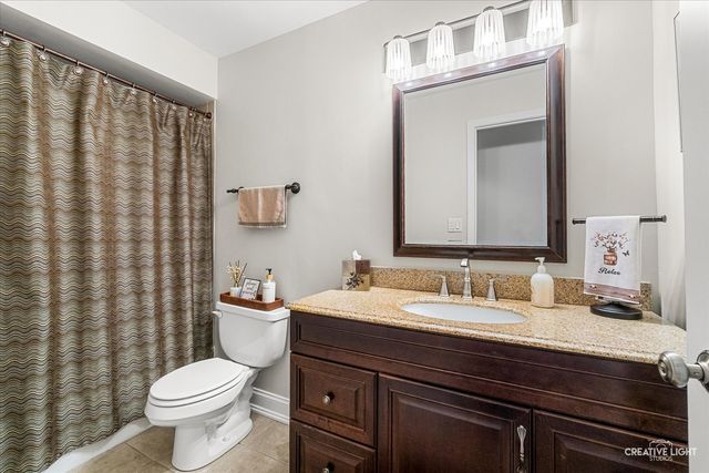8409 Mending Wall Drive, Woodridge, IL 60517