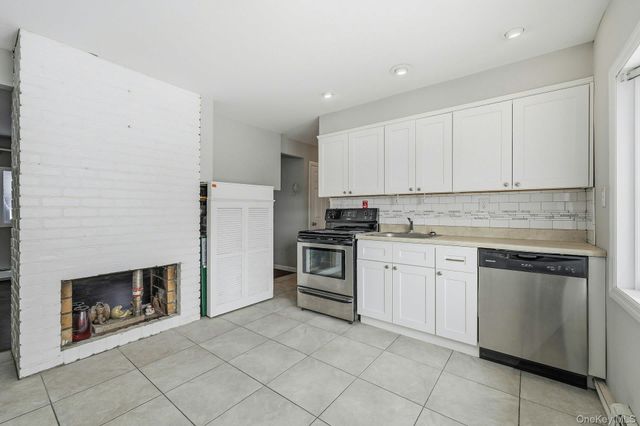 23 Elm Drive W, Levittown, NY 11756