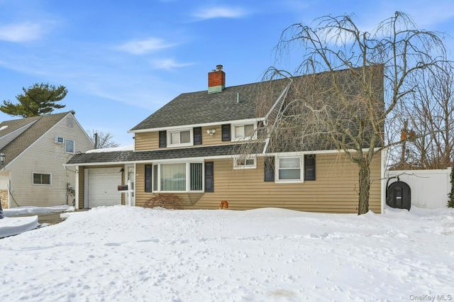 23 Elm Drive W, Levittown, NY 11756