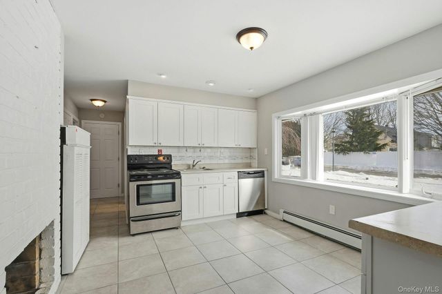 23 Elm Drive W, Levittown, NY 11756