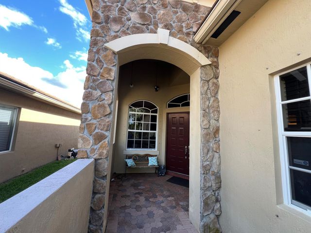 9534 Osprey Isles Boulevard, Palm Beach Gardens, FL 33412