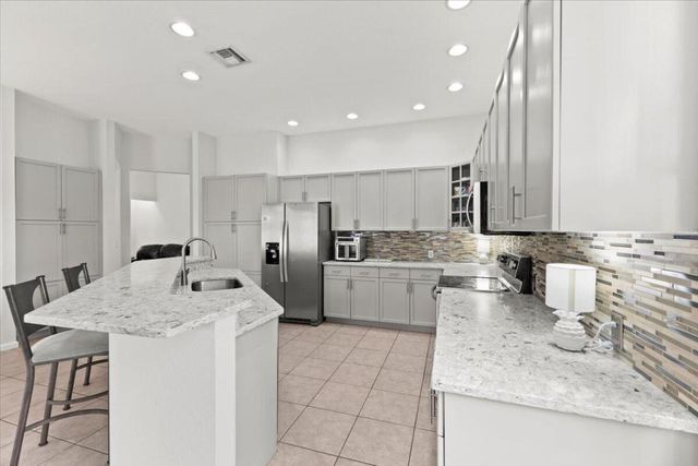 7571 Greenville Circle, Lake Worth, FL 33467