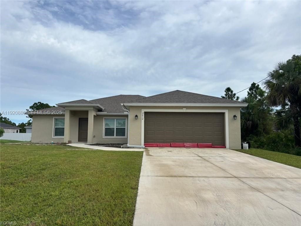 2614 27th ST W, Lehigh Acres, FL 33971