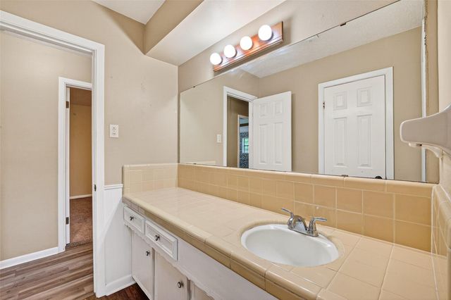210 Woodhaven Street, Highlands, TX 77562