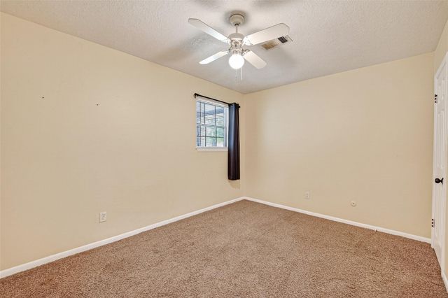 210 Woodhaven Street, Highlands, TX 77562