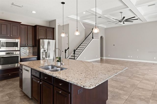 7011 COVINGTON STONE AVENUE, Apollo Beach, FL 33572