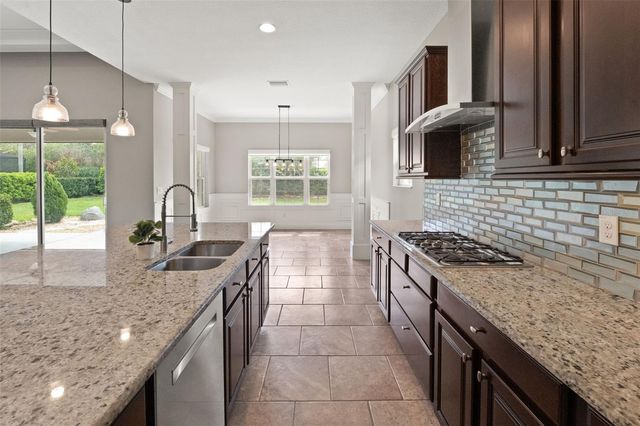 7011 COVINGTON STONE AVENUE, Apollo Beach, FL 33572