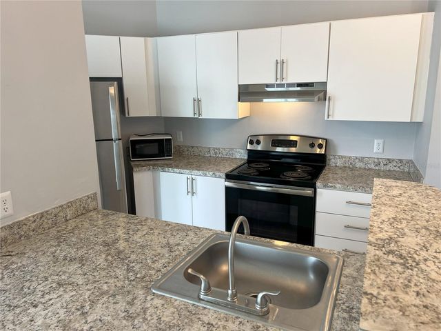 2568 WOODGATE BOULEVARD 206, Orlando, FL 32822