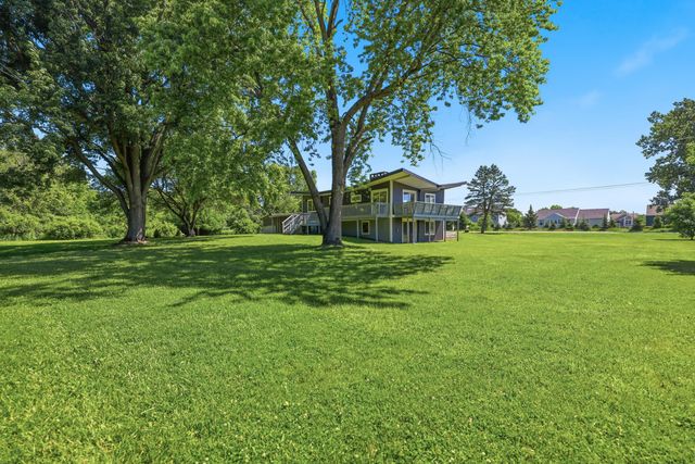6335 Pine Island Drive Ne, Plainfield Twp, MI 49321