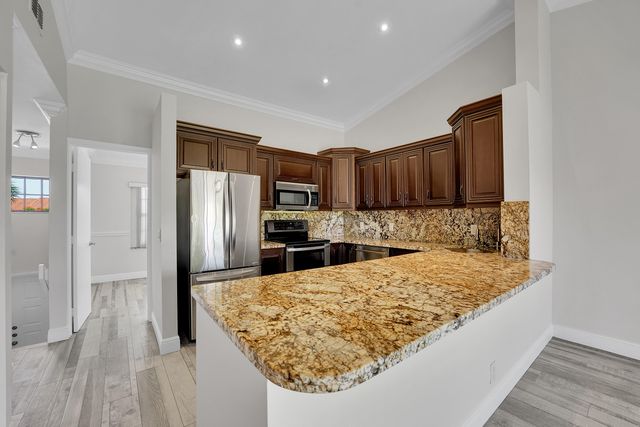 704 Freedom Court, Deerfield Beach, FL 33442