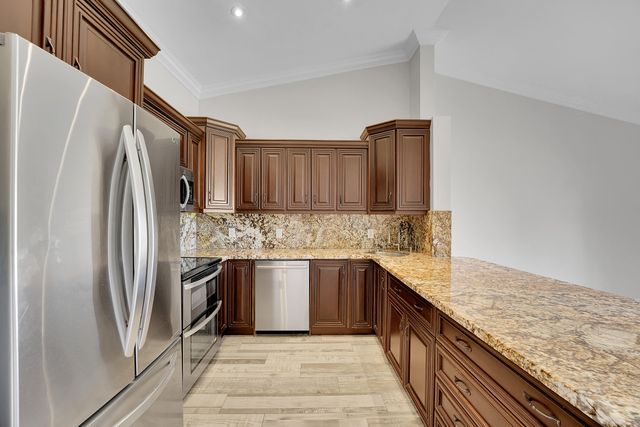 704 Freedom Court, Deerfield Beach, FL 33442