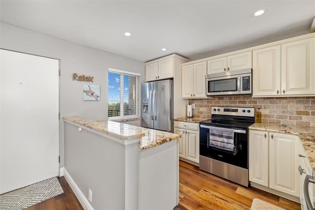 8911 MIDNIGHT PASS ROAD 409, Sarasota, FL 34242
