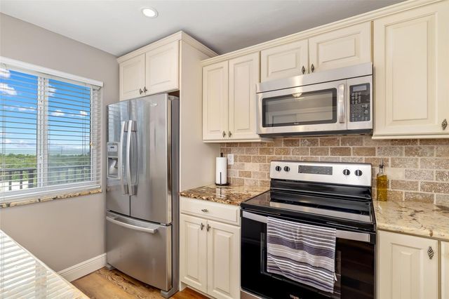 8911 MIDNIGHT PASS ROAD 409, Sarasota, FL 34242
