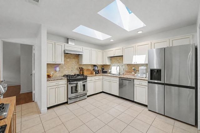 69 Wind Whisper Court, The Woodlands, TX 77380