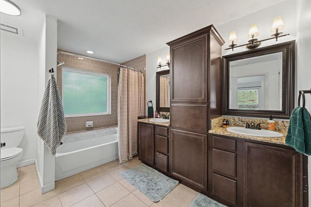 69 Wind Whisper Court, The Woodlands, TX 77380