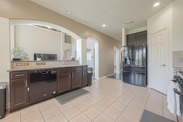 9018 Carriage Point Drive, Sugar Land, TX 77479