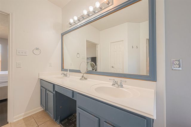 9018 Carriage Point Drive, Sugar Land, TX 77479