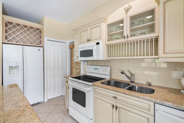 221 THORNTON Drive, Palm Beach Gardens, FL 33418