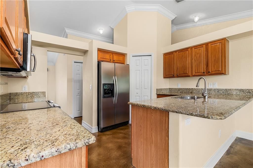 Image 3 of property listing at 1303 SW 43rd LN, Cape Coral, FL 33914