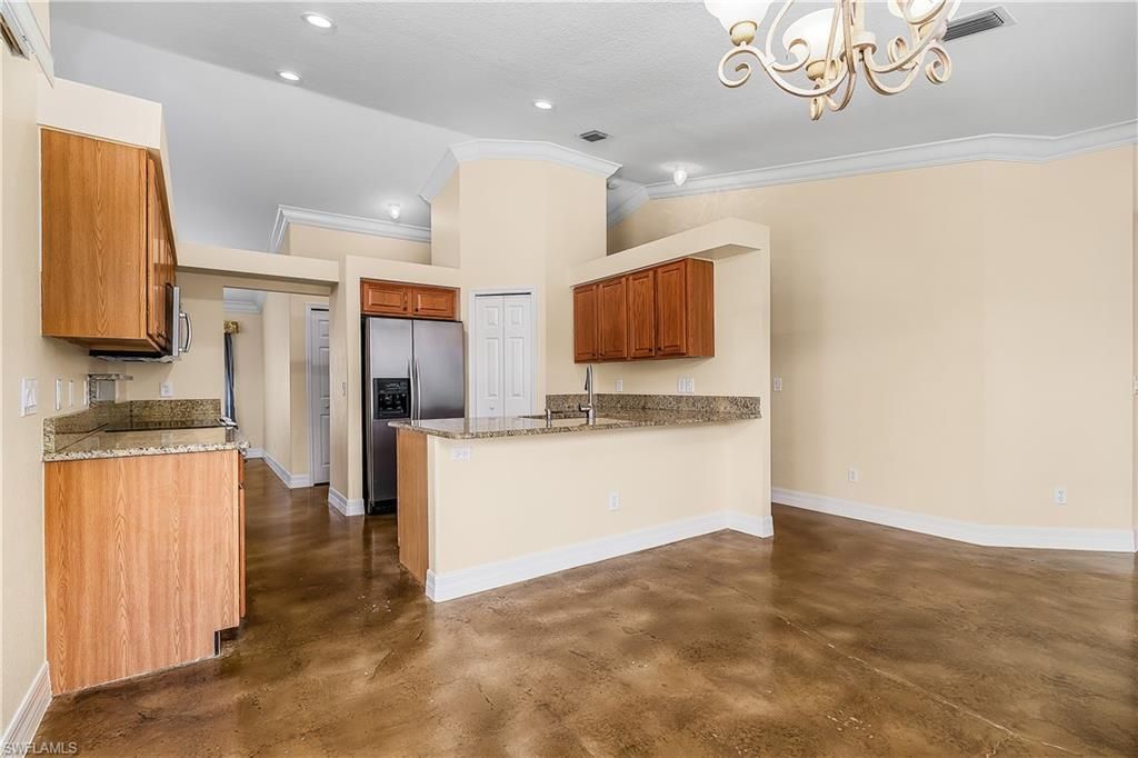 Image 5 of property listing at 1303 SW 43rd LN, Cape Coral, FL 33914