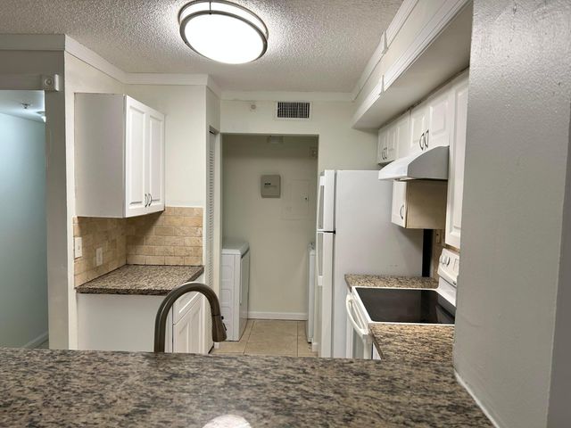 7872 SONOMA SPRINGS Circle 103, Lake Worth, FL 33463