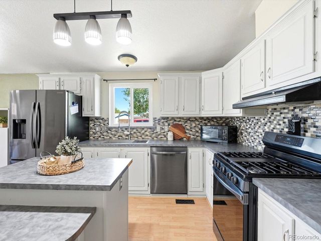 647 Stampede Dr, Brighton, CO 80603