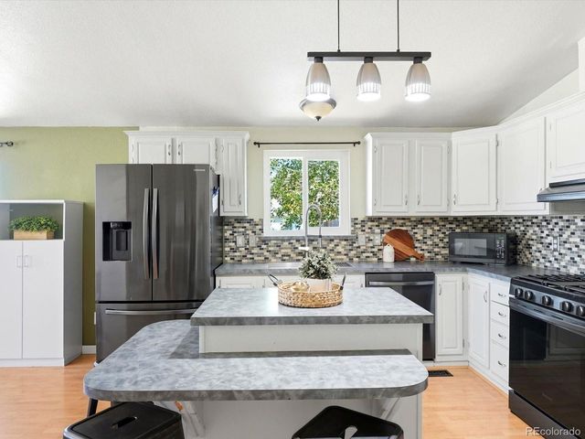 647 Stampede Dr, Brighton, CO 80603