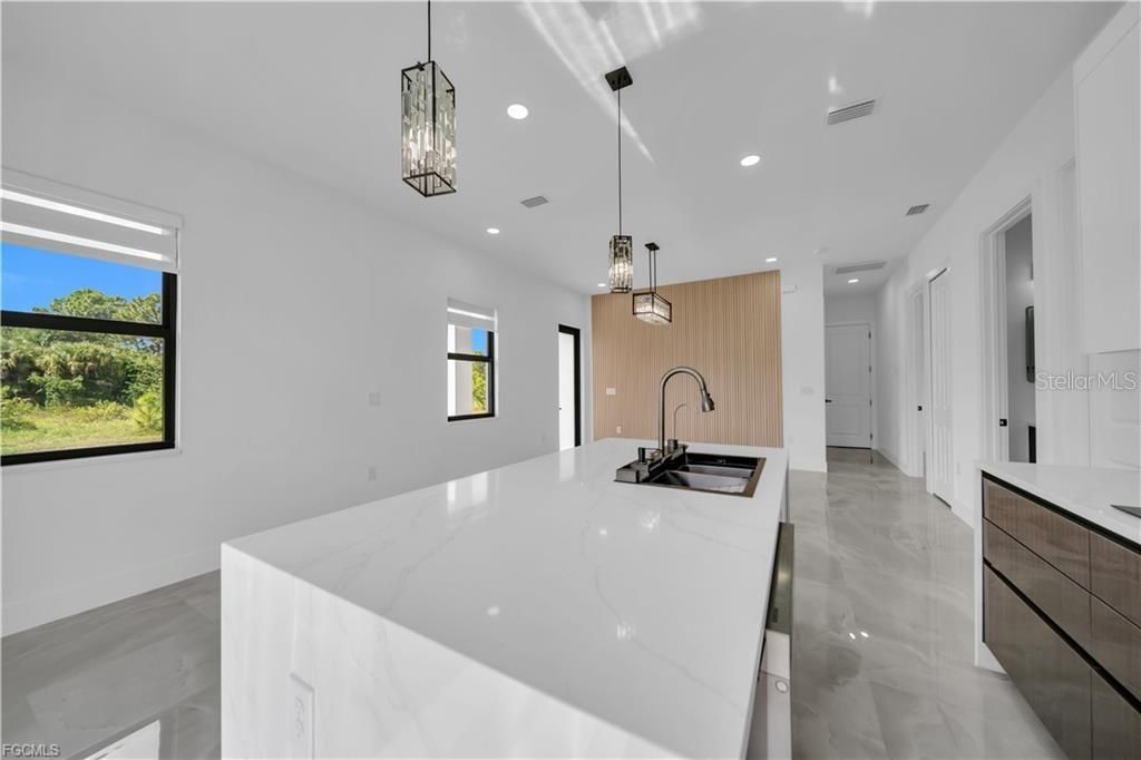 Image 12 of property listing at 711 ROMA AVENUE S, Lehigh Acres, FL 33974