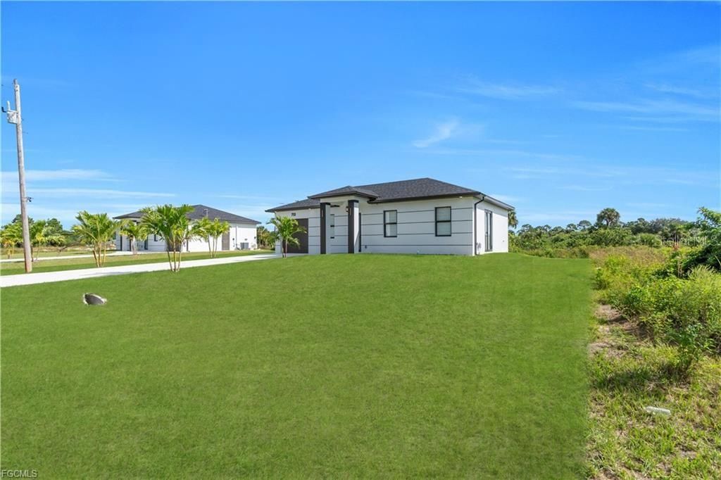 Image 27 of property listing at 711 ROMA AVENUE S, Lehigh Acres, FL 33974