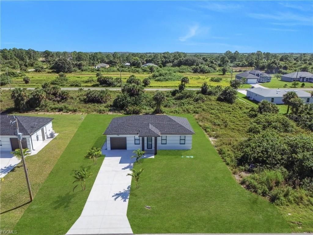 Image 30 of property listing at 711 ROMA AVENUE S, Lehigh Acres, FL 33974