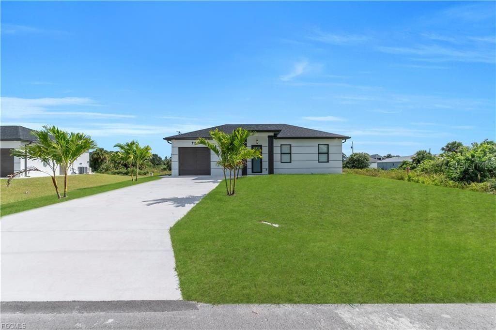 Image 4 of property listing at 711 ROMA AVENUE S, Lehigh Acres, FL 33974