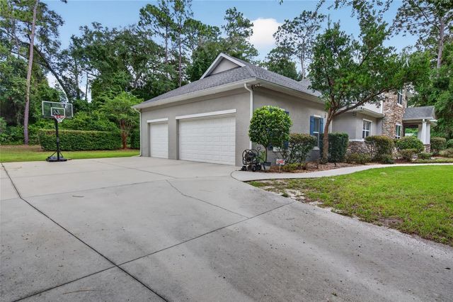 1515 RAMBLING OAKS LANE, Deland, FL 32720