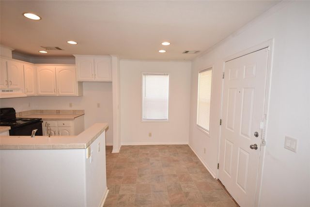 10010 Sugarvine Lane, Tomball, TX 77375