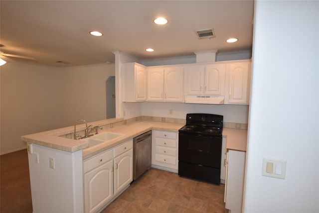 10010 Sugarvine Lane, Tomball, TX 77375