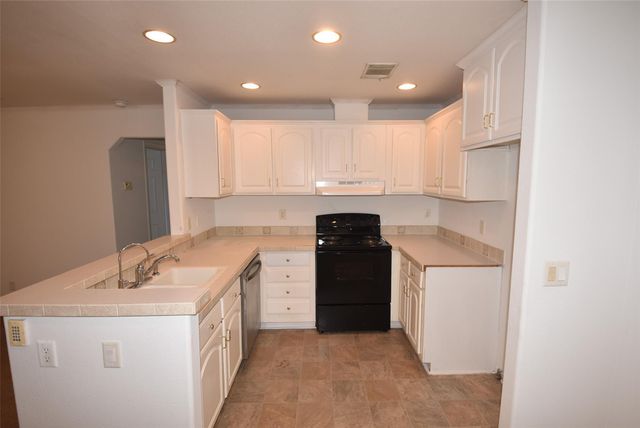 10010 Sugarvine Lane, Tomball, TX 77375