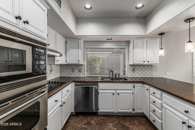 10709 E CHAMPAGNE Drive, Sun Lakes, AZ 85248