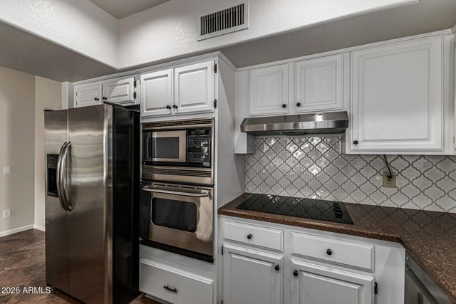 10709 E CHAMPAGNE Drive, Sun Lakes, AZ 85248