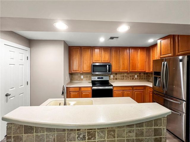 9297 Aegean CIR, Lehigh Acres, FL 33936