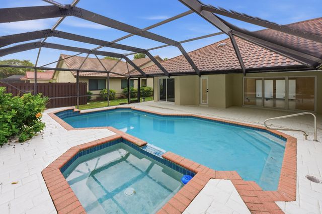 9677 N Springs Way, Coral Springs, FL 33076