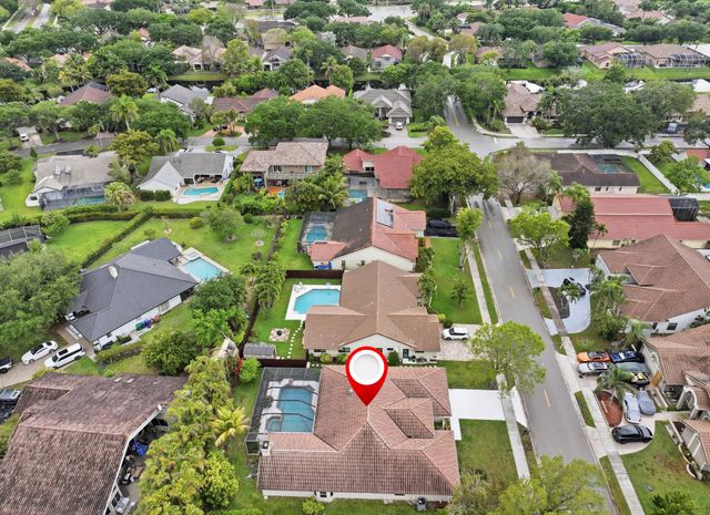 9677 N Springs Way, Coral Springs, FL 33076