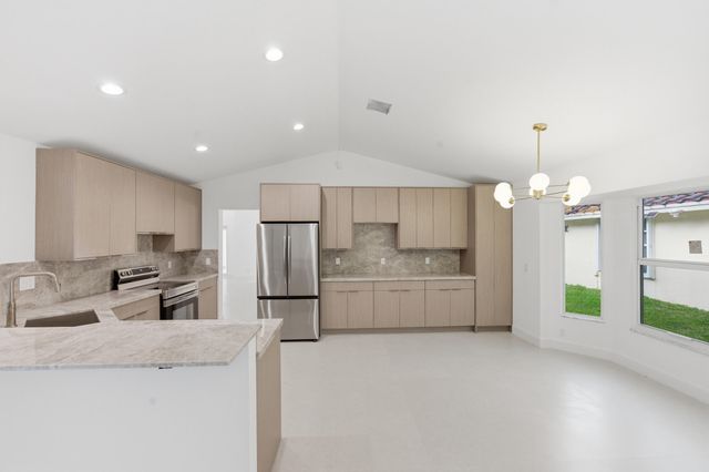 9677 N Springs Way, Coral Springs, FL 33076