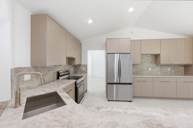 9677 N Springs Way, Coral Springs, FL 33076