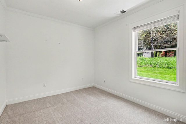 1260 Cramton Avenue NE, Ada, MI 49301