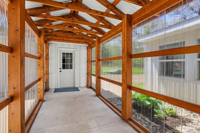 1260 Cramton Avenue NE, Ada, MI 49301