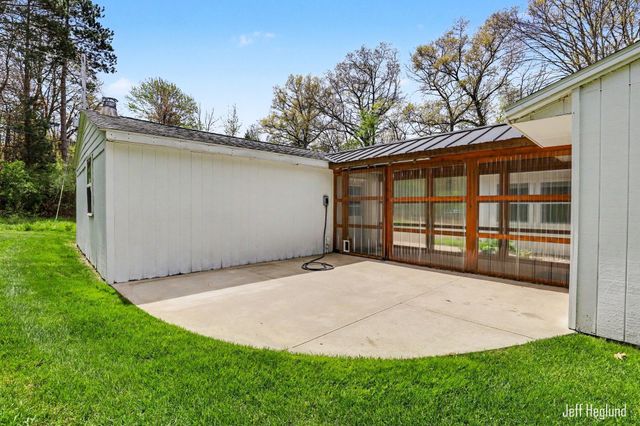 1260 Cramton Avenue NE, Ada, MI 49301