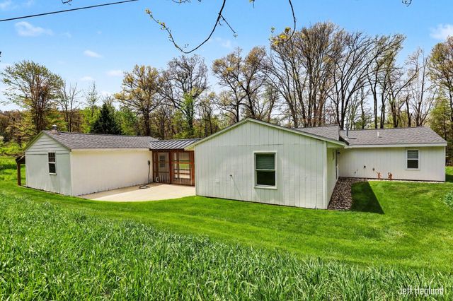 1260 Cramton Avenue NE, Ada, MI 49301