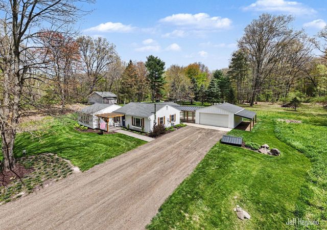 1260 Cramton Avenue NE, Ada, MI 49301