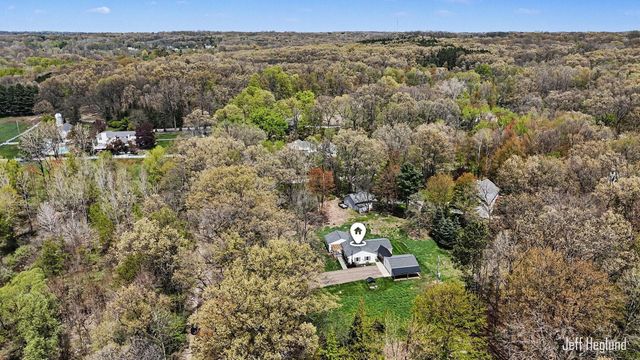 1260 Cramton Avenue NE, Ada, MI 49301