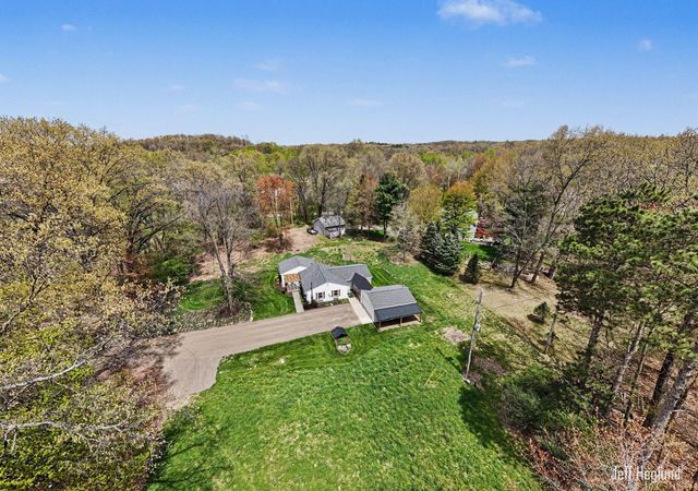 1260 Cramton Avenue NE, Ada, MI 49301